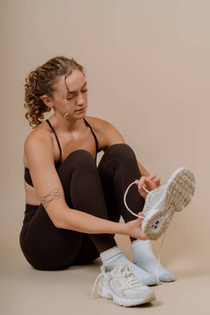 Client pretending to put on shoes