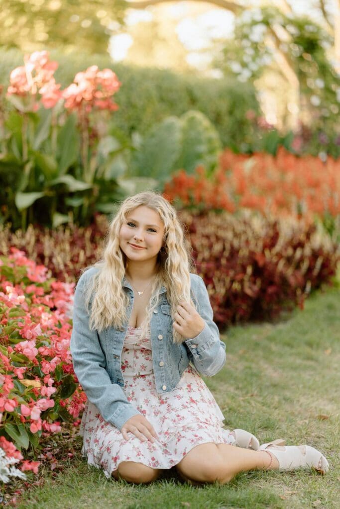 Kalea’s candid laugh captured while standing in a field of flowers.
