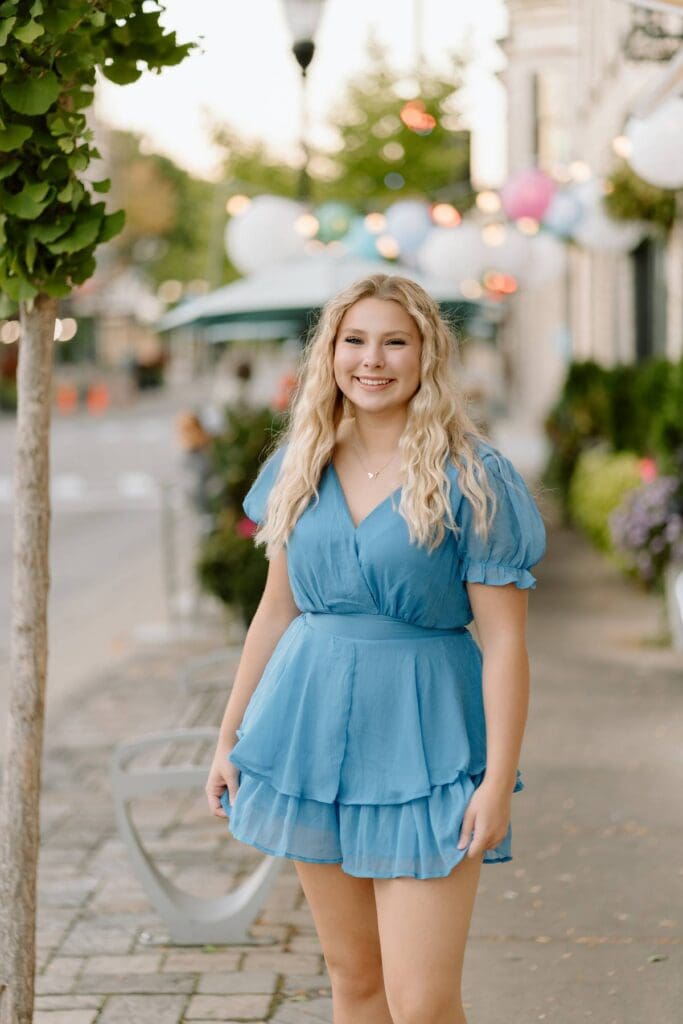 Kalea’s senior photo in front of a trendy café in downtown Milwaukee.