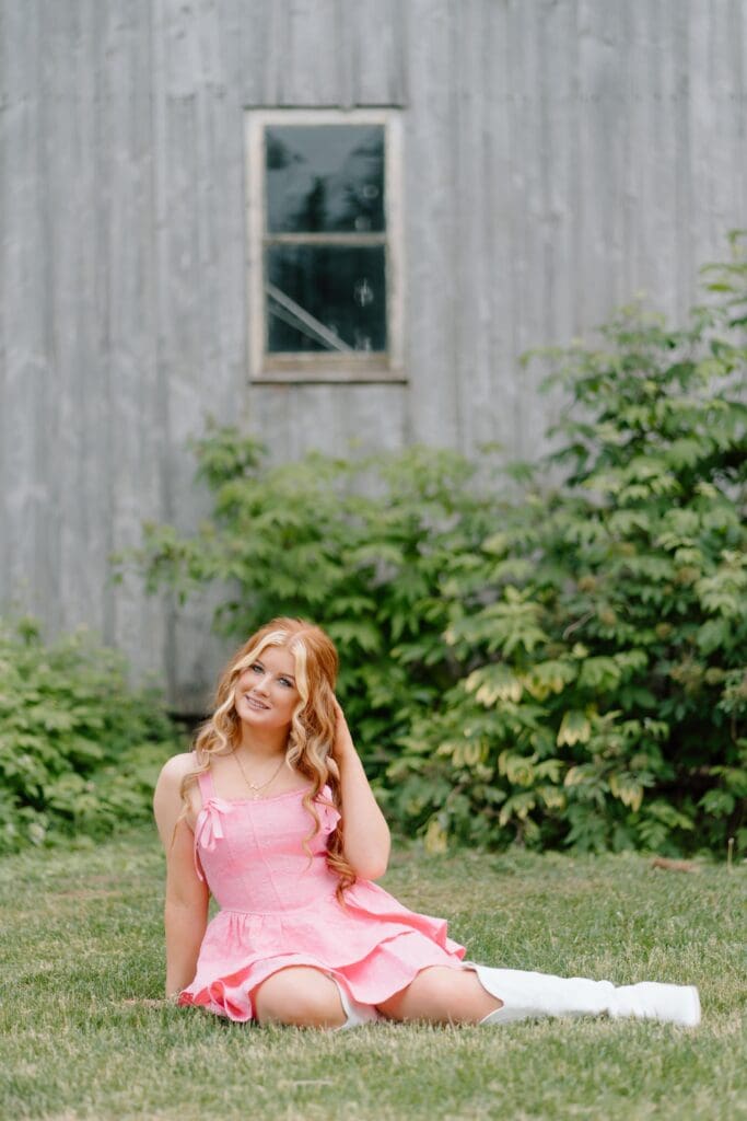Country-inspired senior photo with a swing at Barnwood Farms